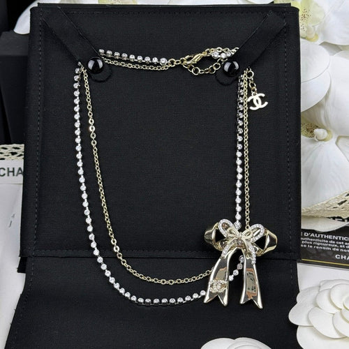 18K  Chanel 25K Bow Tie Diamond Gold Necklace